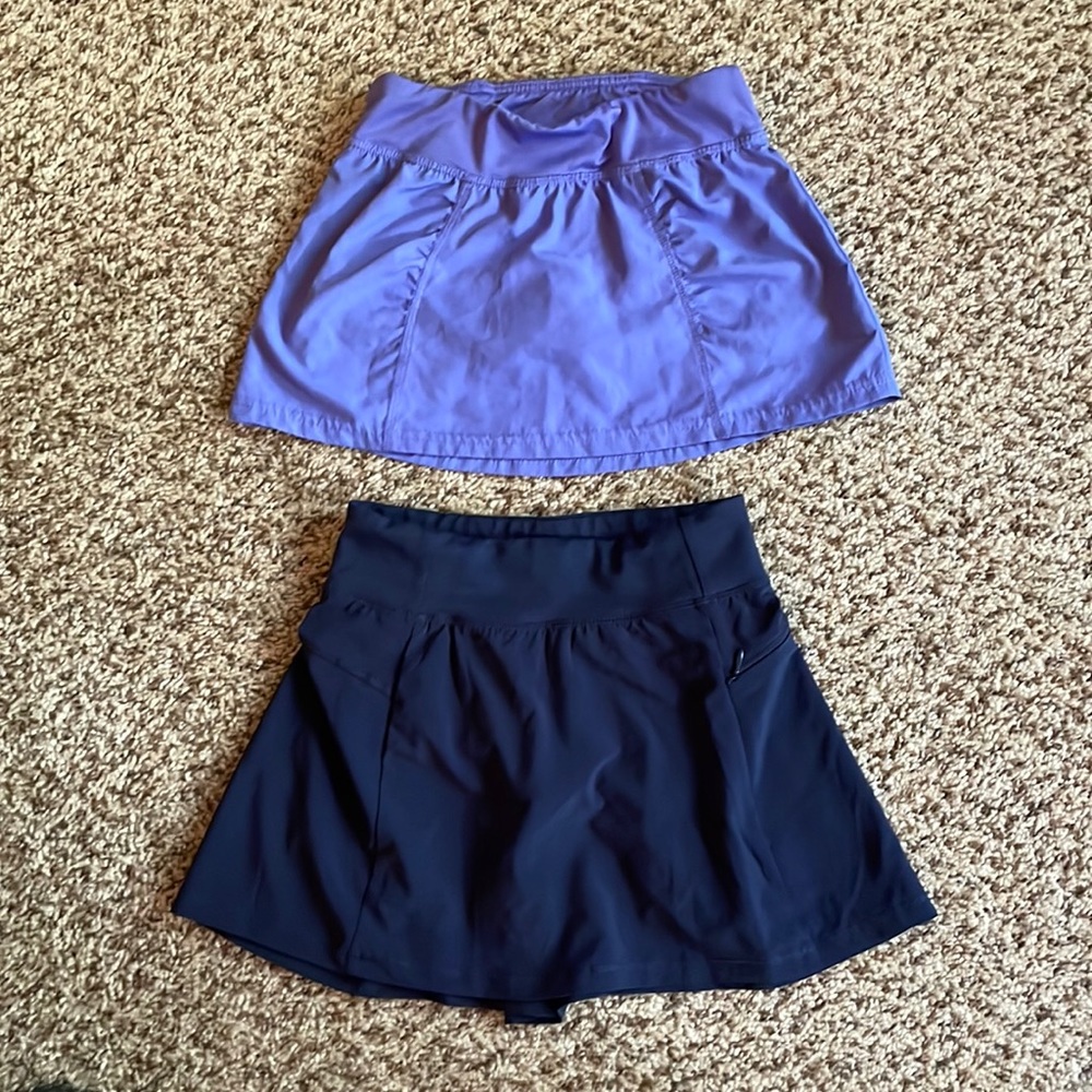 Girls tennis skirts skorts excellent condition S and M lightweight nylon spandex